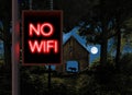 There is no wifi signal out here in a rural setting with and old barn and a horse at night Royalty Free Stock Photo