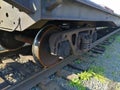 Old, rusty wagon wheels with spring and brakes