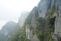 There is a path on the bare mountain wall. Characteristics of karst landforms.