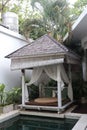 Pavilion or gazebo near a swimming pool in the villa Royalty Free Stock Photo