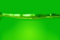The movement of water on a gradient background from yellow to green Royalty Free Stock Photo
