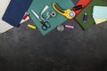 Quilting, embroidery and sewing tools on the dark background. patchwork knife, scissors, lined cutting mat, self-locking, threads Royalty Free Stock Photo