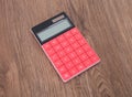 There is a red calculator on the table Royalty Free Stock Photo