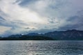 There are ripples on the surface of the lake. A boat is floating on the water Royalty Free Stock Photo