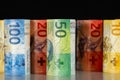 There are rolled-up Swiss banknotes Royalty Free Stock Photo