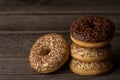 Ring doughnuts covered with vanilla and chocolate glaze, topped with sprinkles.