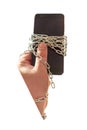 There`s a phone in my hand. They are in a chain. There is vignetting Royalty Free Stock Photo