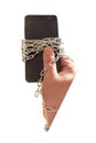 There`s a phone in my hand. They are in a chain. There is vignetting Royalty Free Stock Photo