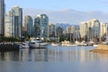 there are several boats parked near the shoreline of the water Royalty Free Stock Photo