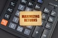 There is a sign on the calculator that says - Maximizing returns