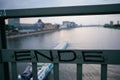 the word ende is written on the railing. In the background is a ship on the river. Royalty Free Stock Photo
