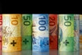 There are some rolled-up Swiss banknotes Royalty Free Stock Photo