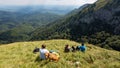 Friends hiking through the wilderness of Buila Vanturarita National Park in Romania Royalty Free Stock Photo