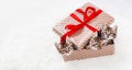 there are three gray striped kittens are sitting in a gift box. Together they are looking into the frame Royalty Free Stock Photo