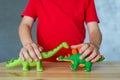 A child plays with animal figures Royalty Free Stock Photo