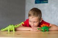 A child plays with animal figures Royalty Free Stock Photo