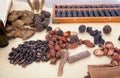 There are various medicinal materials and abacus on the table in the Chinese medicine pharmacy