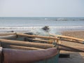 There is a wooden fishing boat on the beach. Royalty Free Stock Photo