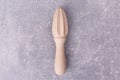 A wooden squeezer on the table Royalty Free Stock Photo