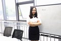 Asia Chinese office lady woman girl hand write goal at whiteboard work smile wear business occupation suit workplace Royalty Free Stock Photo