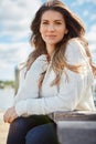 Theres calmness to a life lived in gratitude. Portrait of a beautiful young woman relaxing outdoors. Royalty Free Stock Photo