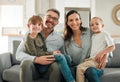 Theres enough love to go around. a family relaxing together at home.