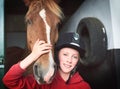 Theres a lot to love about a horse. a teenage girl bonding with her horse.