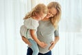 Theres more than enough love for both of them. a pregnant woman spending time with her little girl. Royalty Free Stock Photo