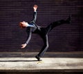 Theres no avoiding the banana skins in business. A young businessman tripping on a banana peel.