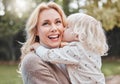 Theres no love like that of a son for his mother. a little boy kissing his mother on the cheek. Royalty Free Stock Photo