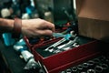 Theres nothing that cant be fixed with the right tools. mans hand reaching for a tool from his toolbox. Royalty Free Stock Photo