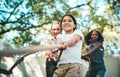 Theres nothing that cant be overcome if we work as one. a group of teenagers playing a game of tug of war at summer camp Royalty Free Stock Photo