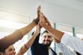 Theres nothing greater than being a part of a team. Cropped shot of a group of businesspeople high fiving in an office. Royalty Free Stock Photo