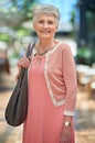 Theres nothing like a little shopping to get me smiling. Cropped portrait of a senior woman out on a shopping spree. Royalty Free Stock Photo