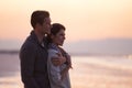 Theres nothing like young love. A young couple enjoying a romantic walk on the beach.