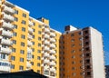 Thermal exterior insulation of new multi-storey building under clear blue sky Royalty Free Stock Photo