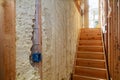 Inside wall insulation in wooden house, building under construction Royalty Free Stock Photo