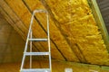 Thermal insulation of the attic in the house Royalty Free Stock Photo