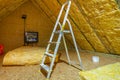 Thermal insulation of the attic in the house Royalty Free Stock Photo