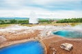 Thermal lake Blesi and eruption of Strokkur Geysir Royalty Free Stock Photo