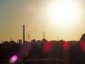 Thermal power plant and electricity lines silhouette at sunset Royalty Free Stock Photo