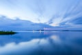 Thermal power plant and the lake at sunset