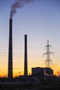 Thermal power plant and sunset sky. Royalty Free Stock Photo