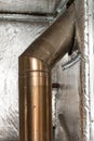 thermal protection with mineral wool with foil, chimney from the fireplace, installation and repair work. Royalty Free Stock Photo