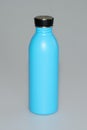 Thermal stainless steel bottle blue on grey background