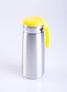 Thermo or Thermo flask from stainless stee on background. Royalty Free Stock Photo