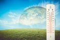 Thermometer check the earth& x27;s temperature with impact of global.