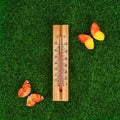 Thermometer displaying high 40 degree hot temperatures in sun summer day