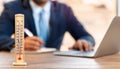 Thermometer In Front Of Businessman Working During Hot Weather Royalty Free Stock Photo