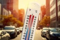 Thermometer in front of cars and traffic Royalty Free Stock Photo